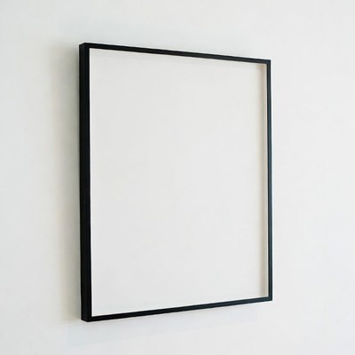 Empty Black Picture Frame on Wall