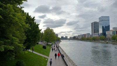 People walking along Seine River