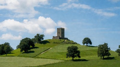 Medieval Tower on Grassy Hill