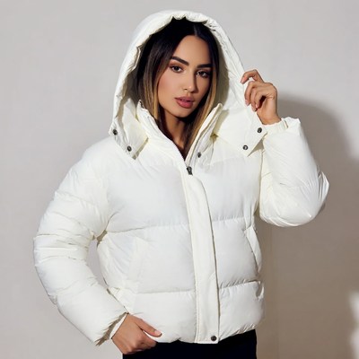 Woman in white puffer jacket with hood