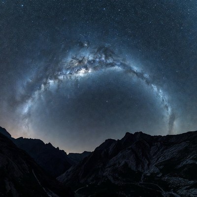 Milky Way arch over mountains