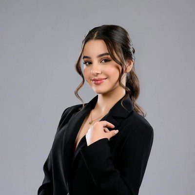 Smiling woman in black blazer