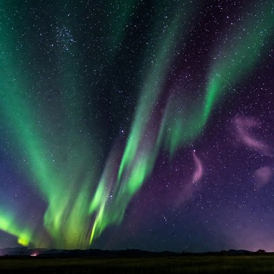 Vibrant Northern Lights over Mountains