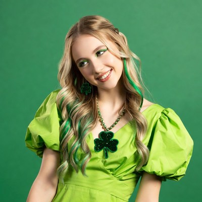 Blonde girl in green shamrock dress