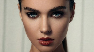 Closeup portrait of woman with bold makeup