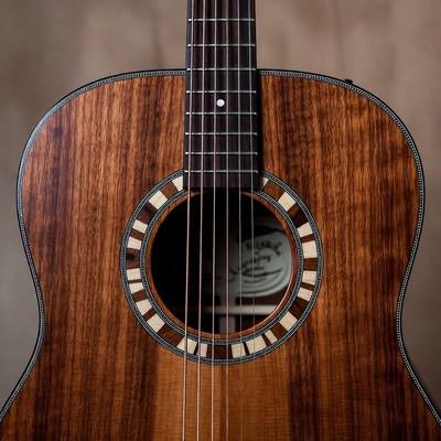 Closeup of koa wood acoustic guitar
