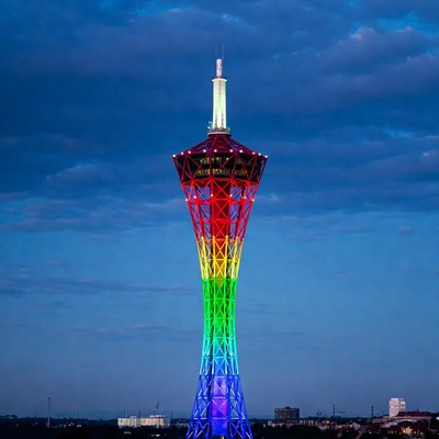 Rainbow-Colored Tower at Night