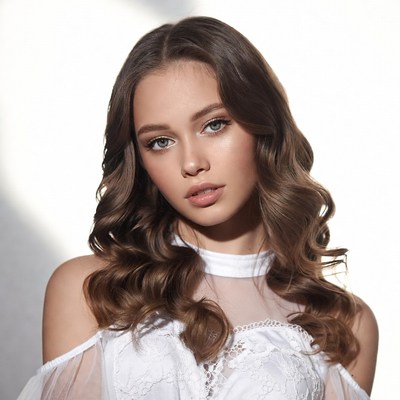 Beautiful woman in white off-shoulder dress