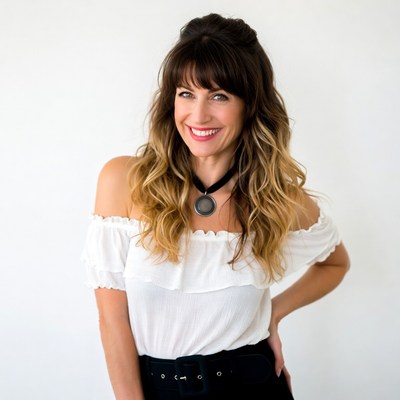 Smiling woman with balayage hair