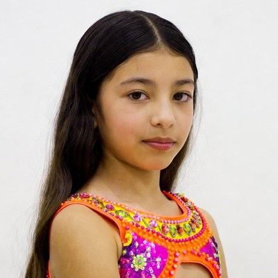 Girl in orange beaded dress