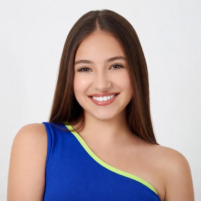 Smiling young woman in blue top