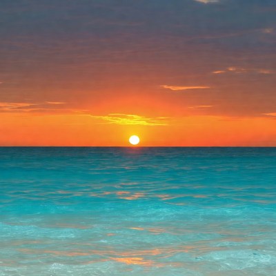 Sunset over turquoise ocean