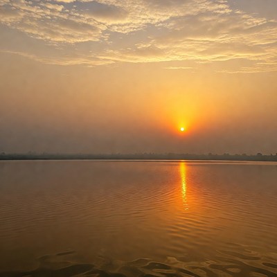 Sunset over calm lake