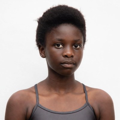 African girl in gray swimsuit