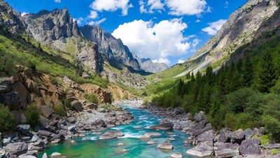 Turquoise River in Mountain Valley