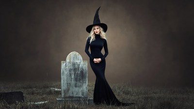 Blonde Witch Standing by Tombstone