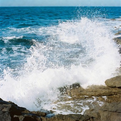 Ocean Waves Crashing on Rocks