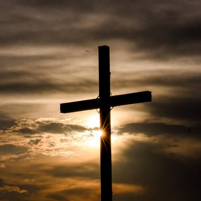 Silhouette Cross with Sun Rays