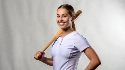 Girl holding baseball bat