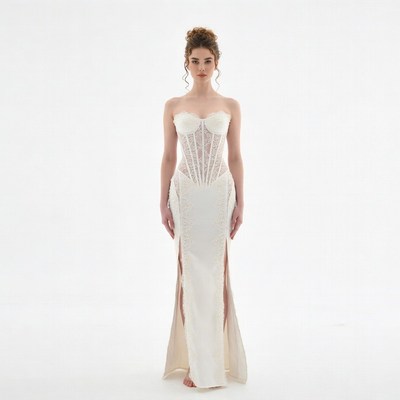 Woman in white lace corset gown
