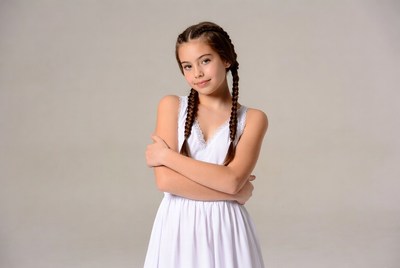 Girl with braids arms crossed