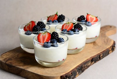 Berry Yogurt Parfaits on Wooden Board