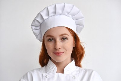 Redhead woman in chef uniform