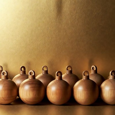 Wooden Christmas Ornaments on Gold Background