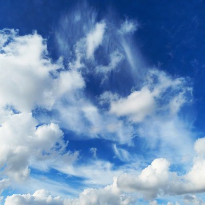 Fluffy Clouds in Blue Sky