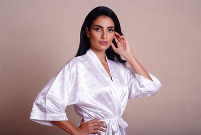 Woman in white satin robe