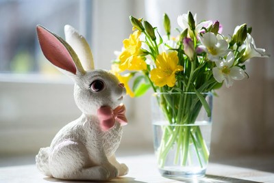 White bunny with spring flowers