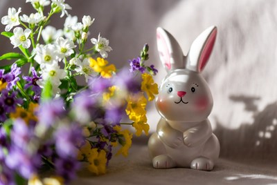 White bunny figurine with flowers