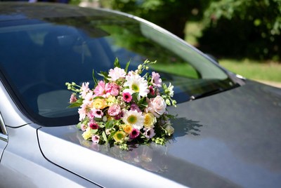 Colorful Bouquet on Car Hood