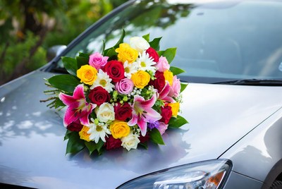 Colorful Bouquet on Car Hood