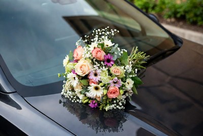 Wedding Bouquet on Black Car Hood