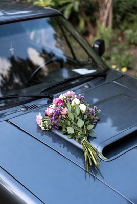 Pink Flower Bouquet on Car Hood