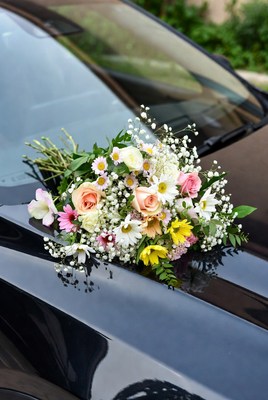 Colorful Bouquet on Black Car Hood