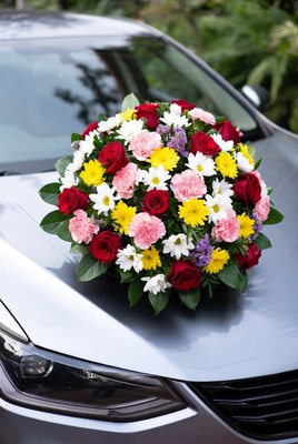 Colorful Flower Bouquet on Silver Car Hood