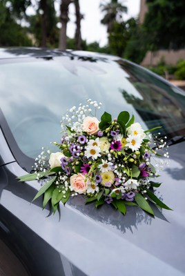 Colorful bouquet on car hood