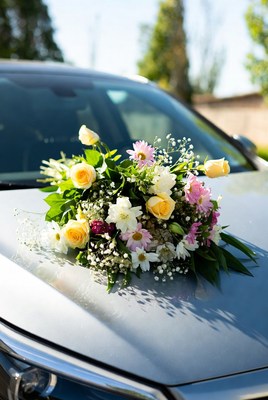 Colorful Flowers Bouquet on Car Hood