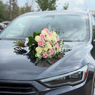 Pink and White Roses Bouquet on Black Car