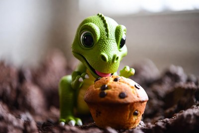 Cute T-Rex toy with muffin