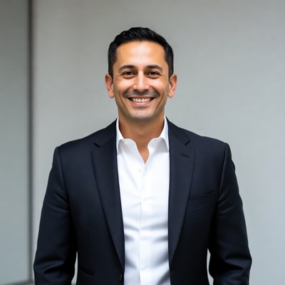 Smiling man in navy suit