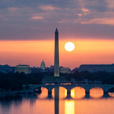 Washington Monument at Sunset with Sun Reflection