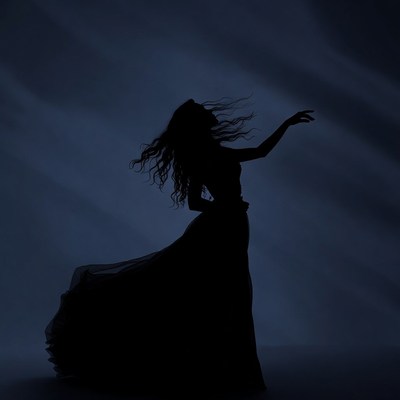 Silhouette of woman in flowing gown