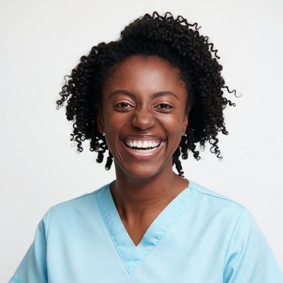 Smiling African-American woman in scrubs
