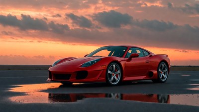 Red Ferrari 458 parked at sunset