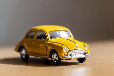 Yellow Miniature Vintage Car