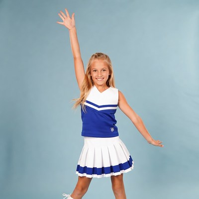 Young girl cheerleader raising hand