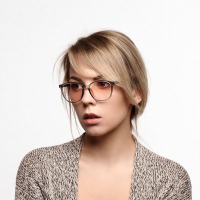 Blonde woman in glasses